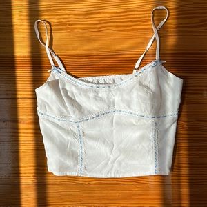 White linen top with blue string